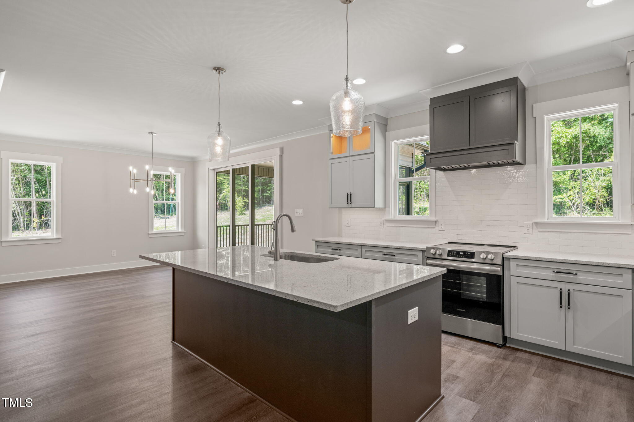 260 Pilot Ridge Road Zebulon, NC 27597 - Photo 9 of 39 a kitchen with a sink stove and microwave