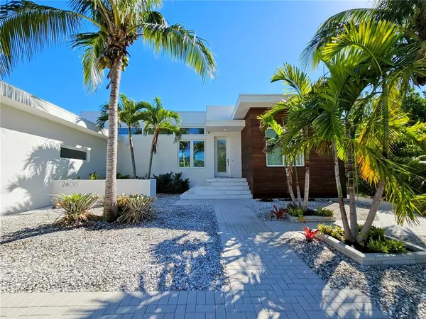 a view of a backyard with a patio