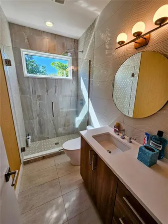 a view of a backyard with sitting area