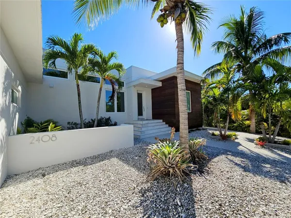 a view of a house with a street