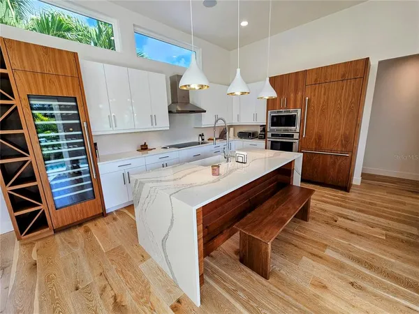 a view of appliances and cabinets