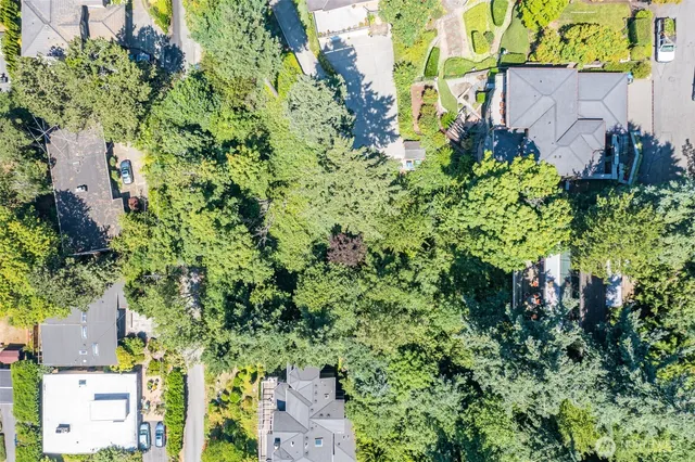an aerial view of a house with a garden
