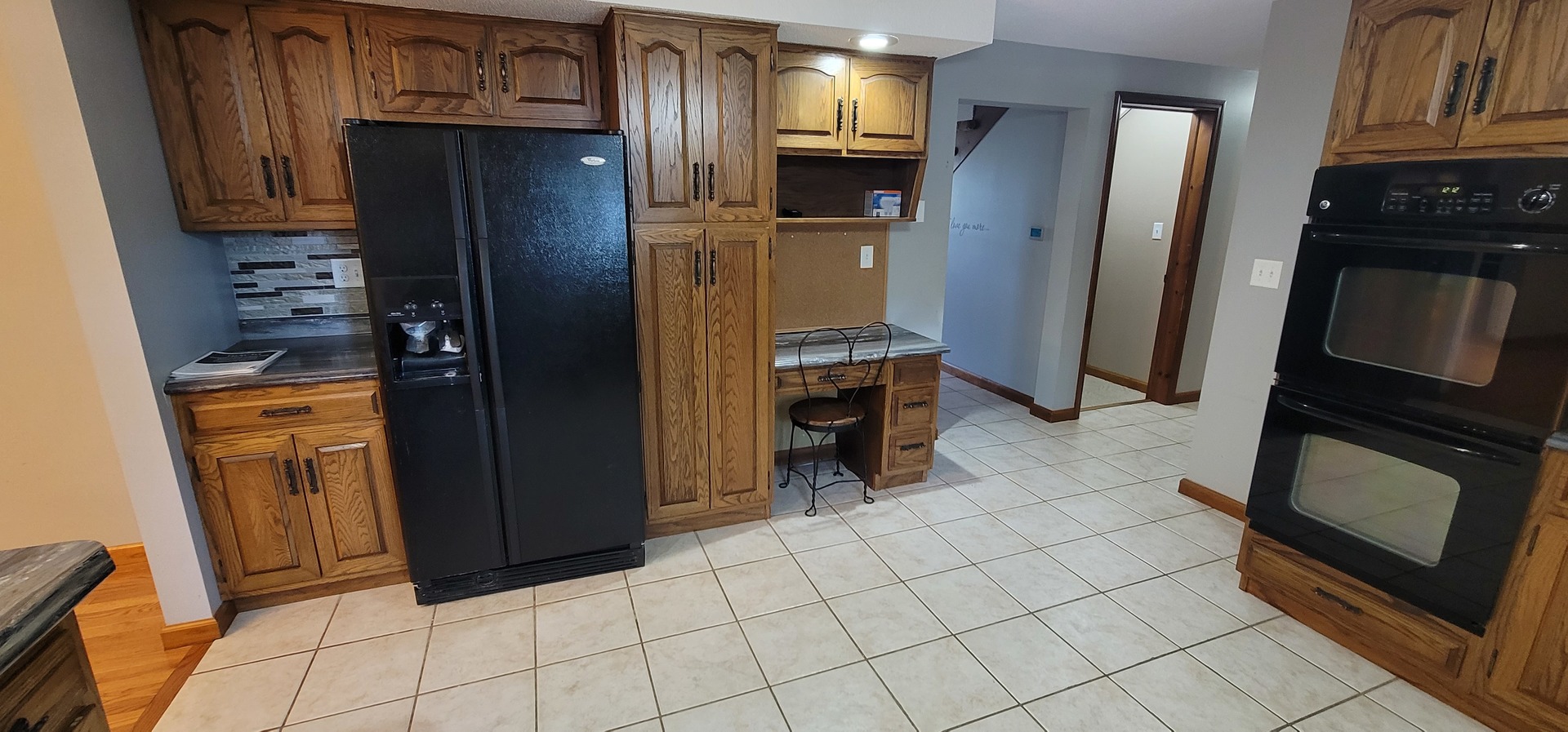 312 West Grove Road Sterling, IL 61081 - Photo 16 of 43 a kitchen with stainless steel appliances granite countertop a refrigerator and a stove