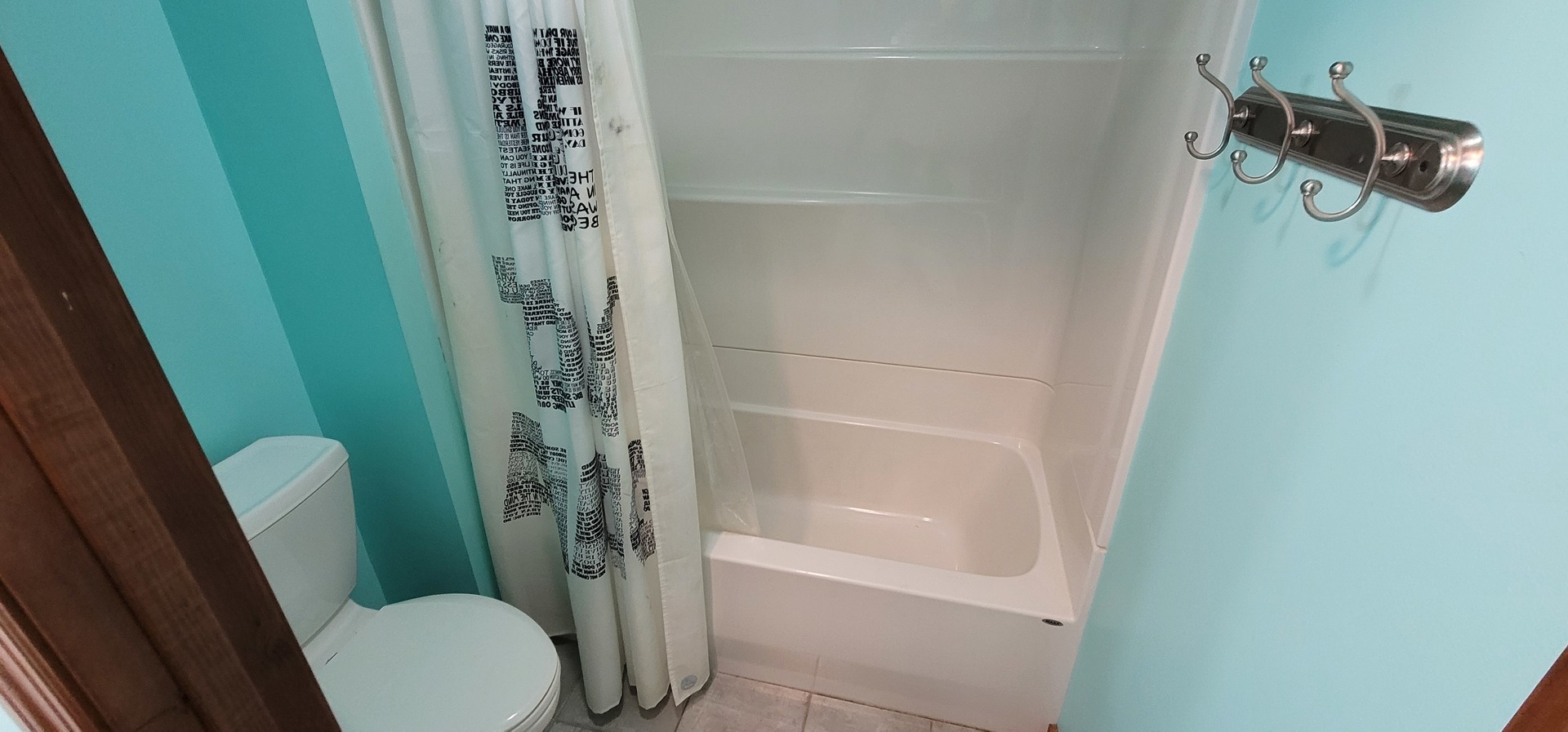 312 West Grove Road Sterling, IL 61081 - Photo 29 of 43 a bathroom with a shower a toilet and sink