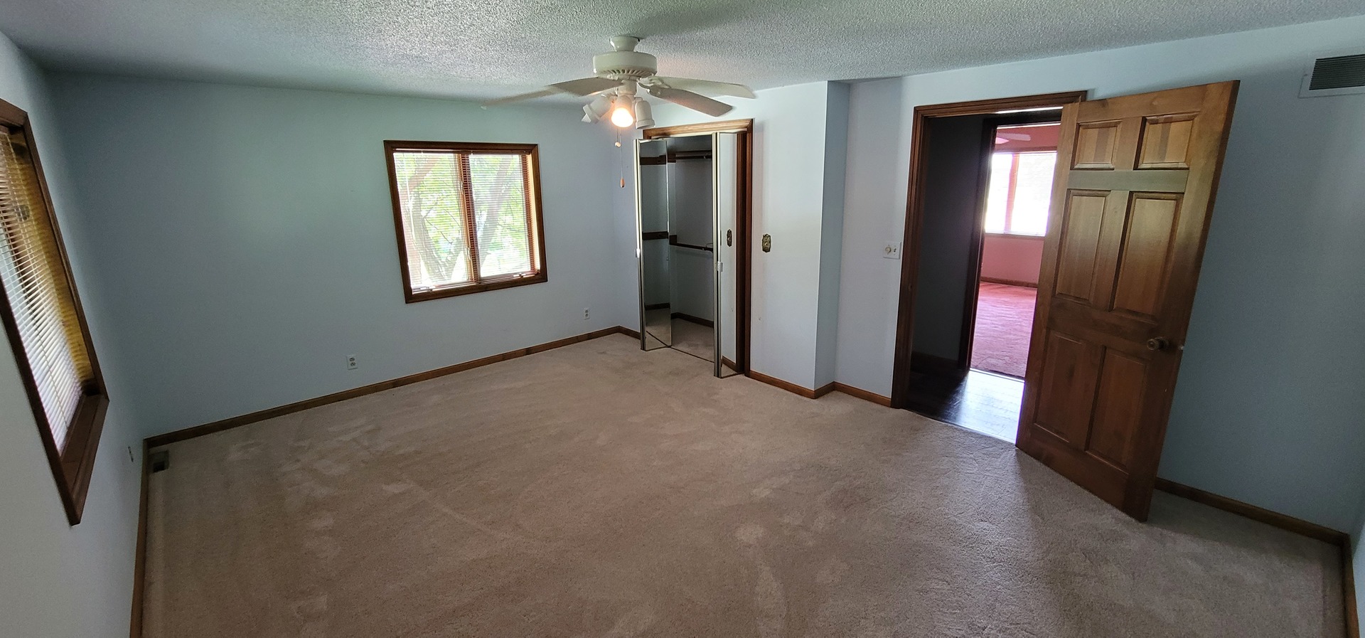 312 West Grove Road Sterling, IL 61081 - Photo 34 of 43 an empty room with windows and closet