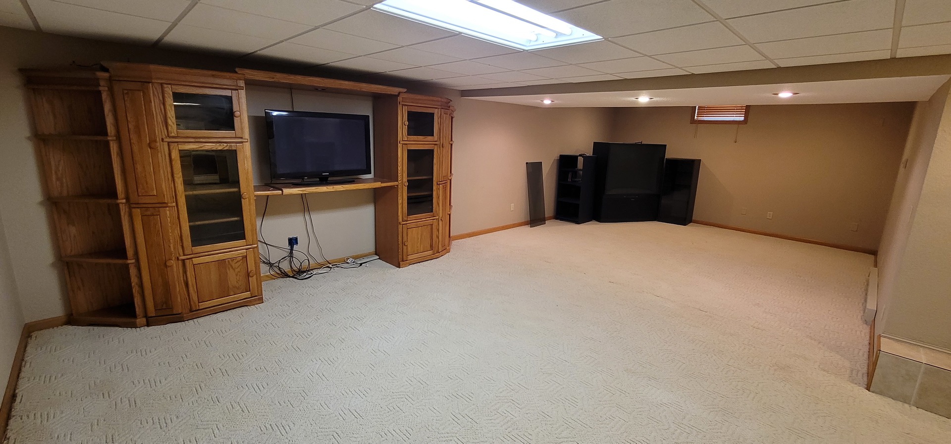 312 West Grove Road Sterling, IL 61081 - Photo 38 of 43 a view of an empty room with furniture and storage