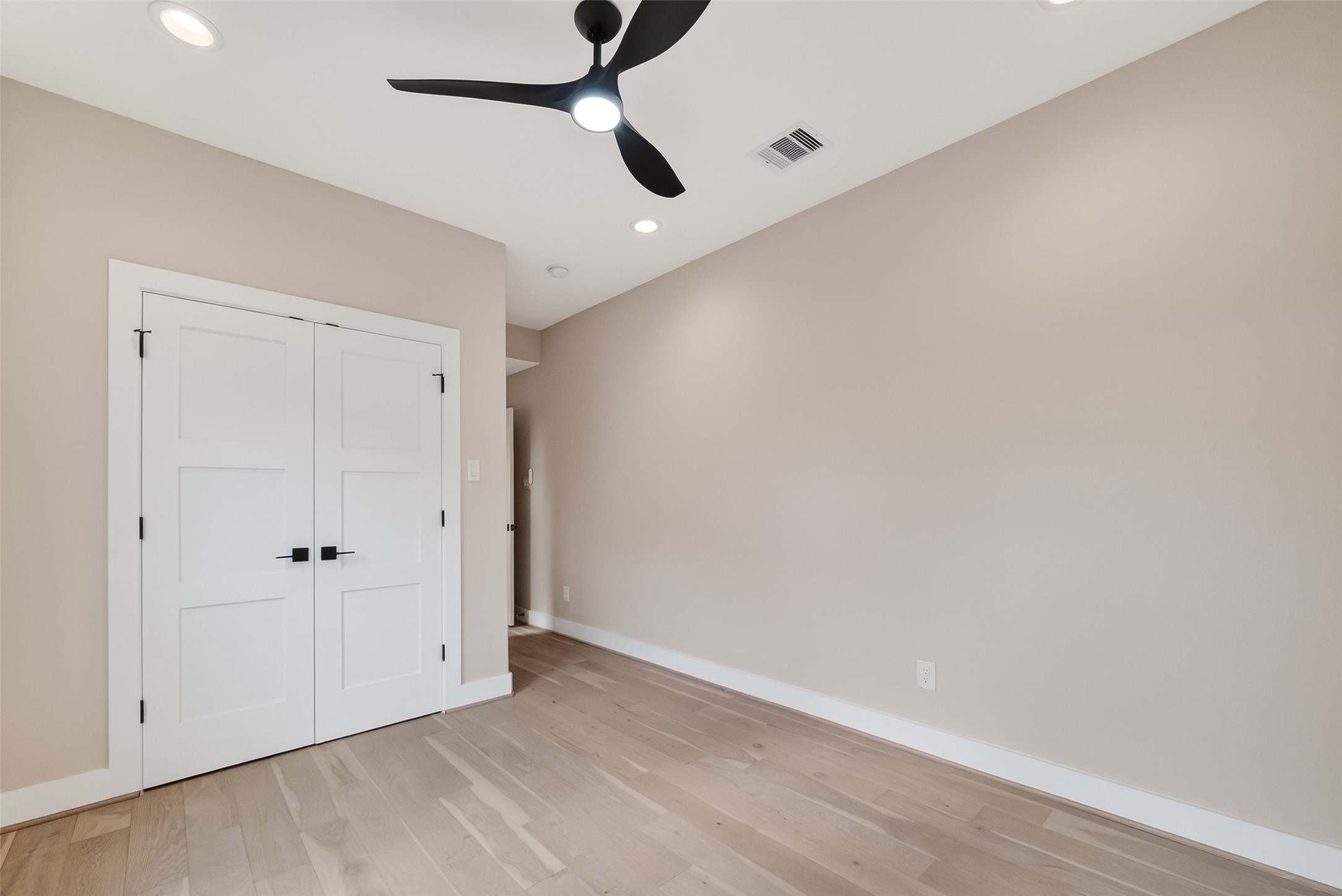 2511 North MacGregor Way Houston, TX 77004 - Photo 11 of 42 wooden floor in an empty room
