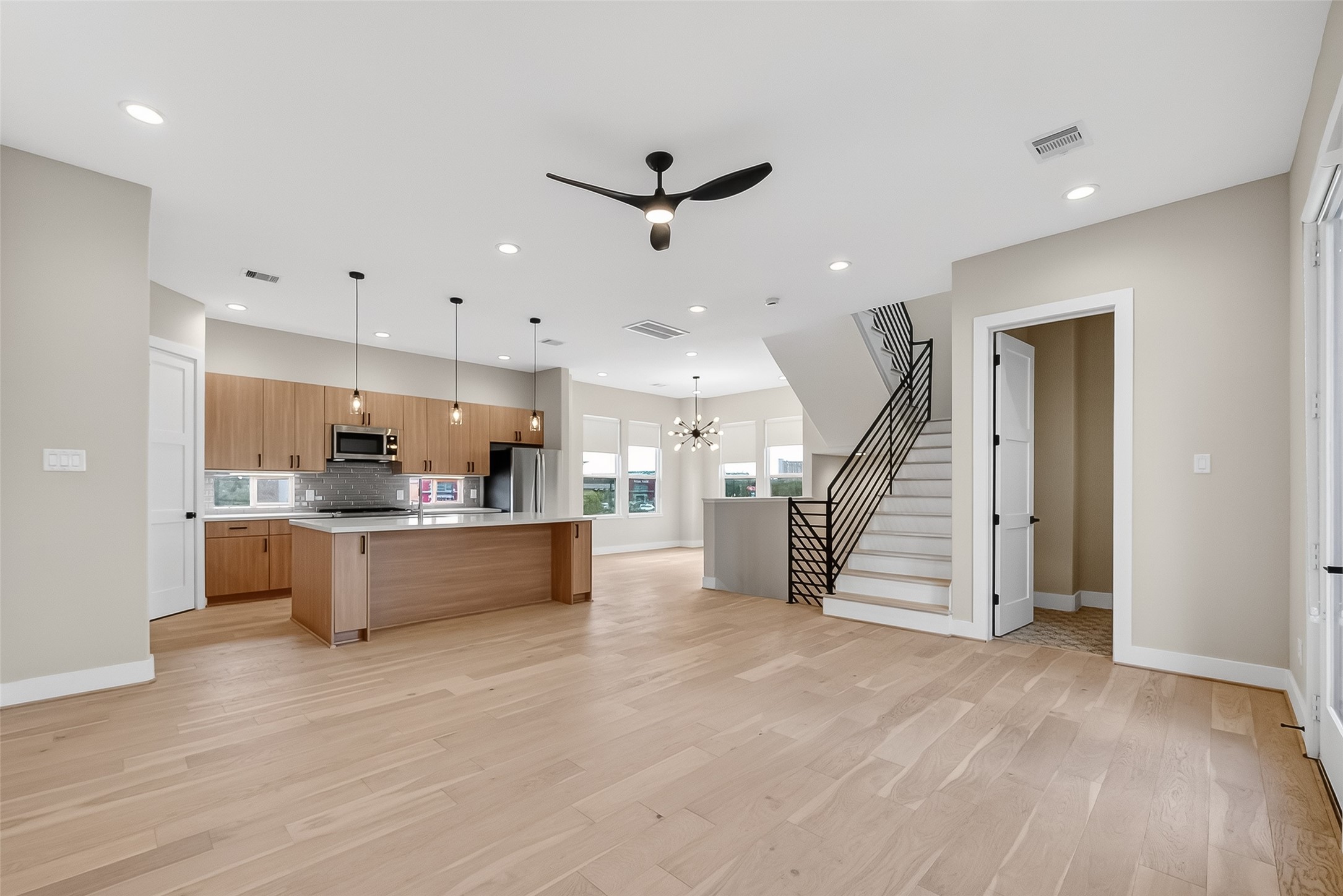 2511 North MacGregor Way Houston, TX 77004 - Photo 14 of 42 a view of kitchen and kitchen with a wooden floor