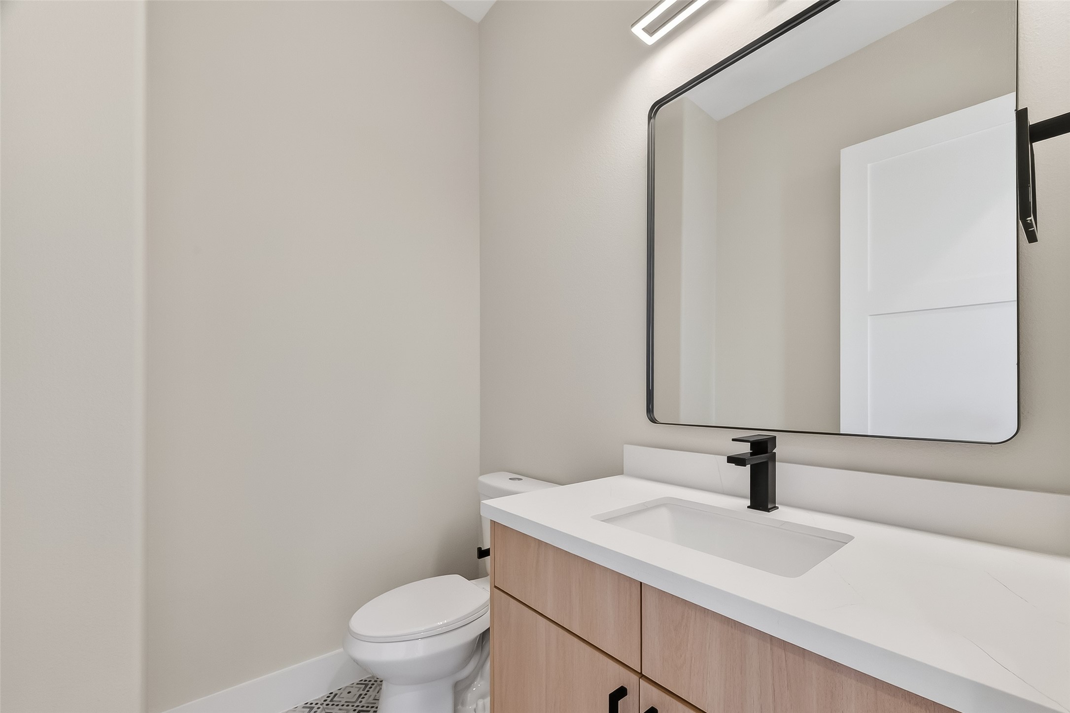 2511 North MacGregor Way Houston, TX 77004 - Photo 16 of 42 a bathroom with a sink and a toilet