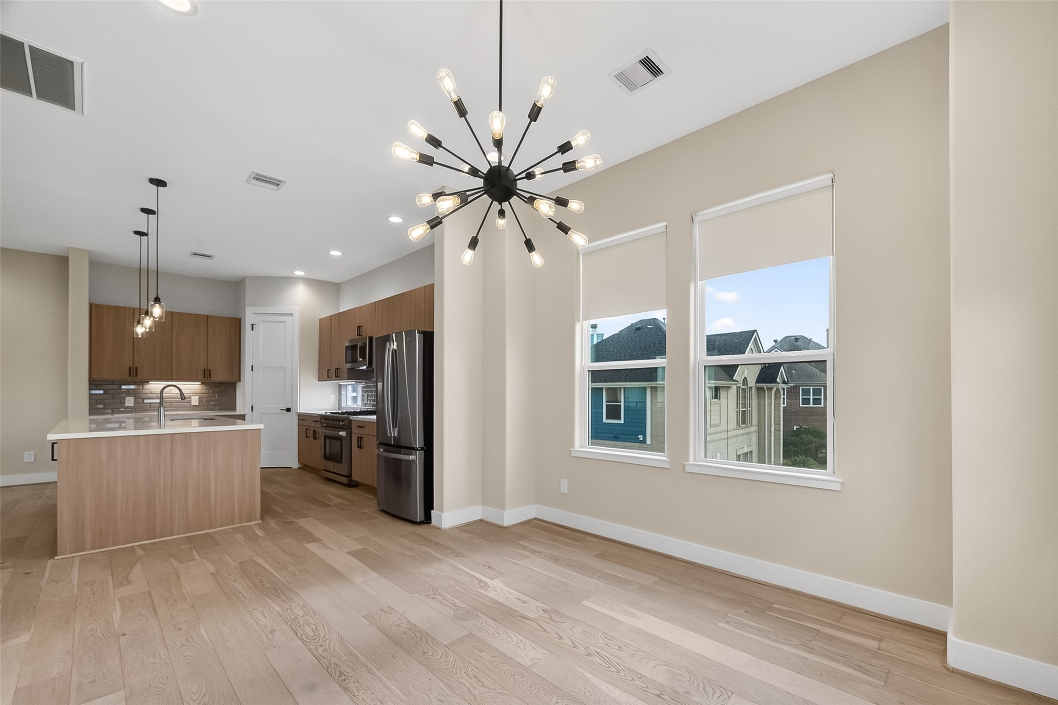 2511 North MacGregor Way Houston, TX 77004 - Photo 19 of 42 Elegant custom lighting highlights the unique character and warmth of this space