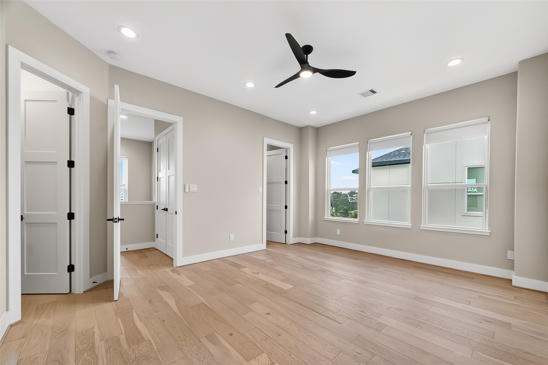 2511 North MacGregor Way Houston, TX 77004 - Photo 34 of 42 a view of empty room with wooden floor and fan