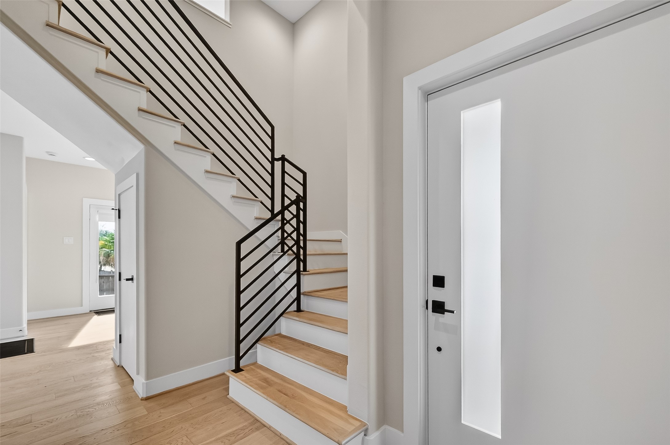 2511 North MacGregor Way Houston, TX 77004 - Photo 5 of 42 a view of entryway with wooden floor