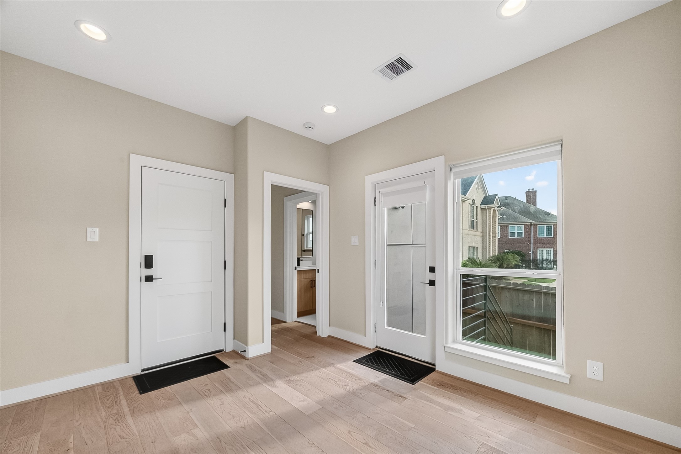 2511 North MacGregor Way Houston, TX 77004 - Photo 7 of 42 a bathroom with a mirror and a shower