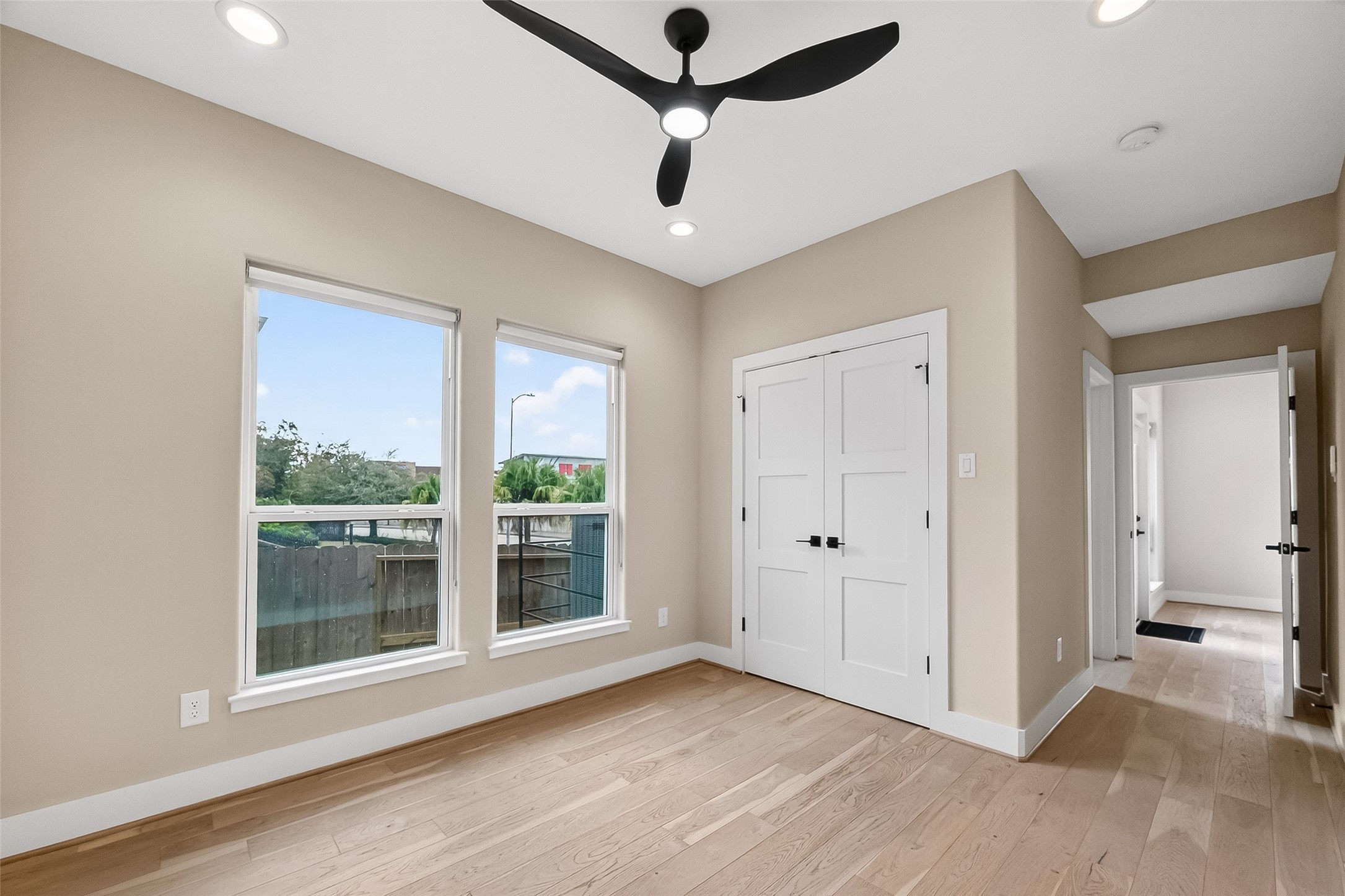 2511 North MacGregor Way Houston, TX 77004 - Photo 10 of 42 a view of a livingroom with a ceiling fan and window