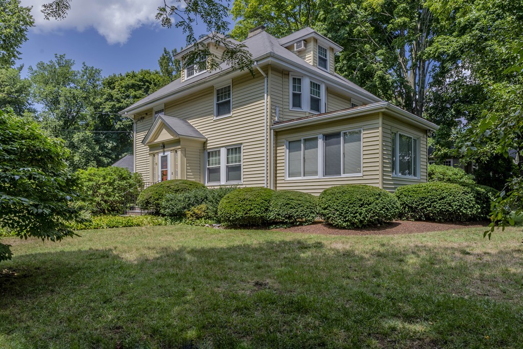 16 Audubon Road Lexington, MA 02421 - Photo 1 of 30 a front view of a house with a yard