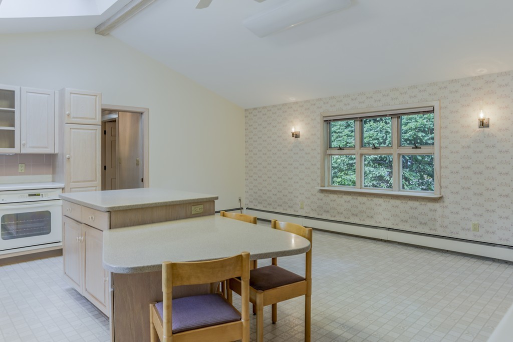 16 Audubon Road Lexington, MA 02421 - Photo 13 of 30 a view of a dining room with furniture and window