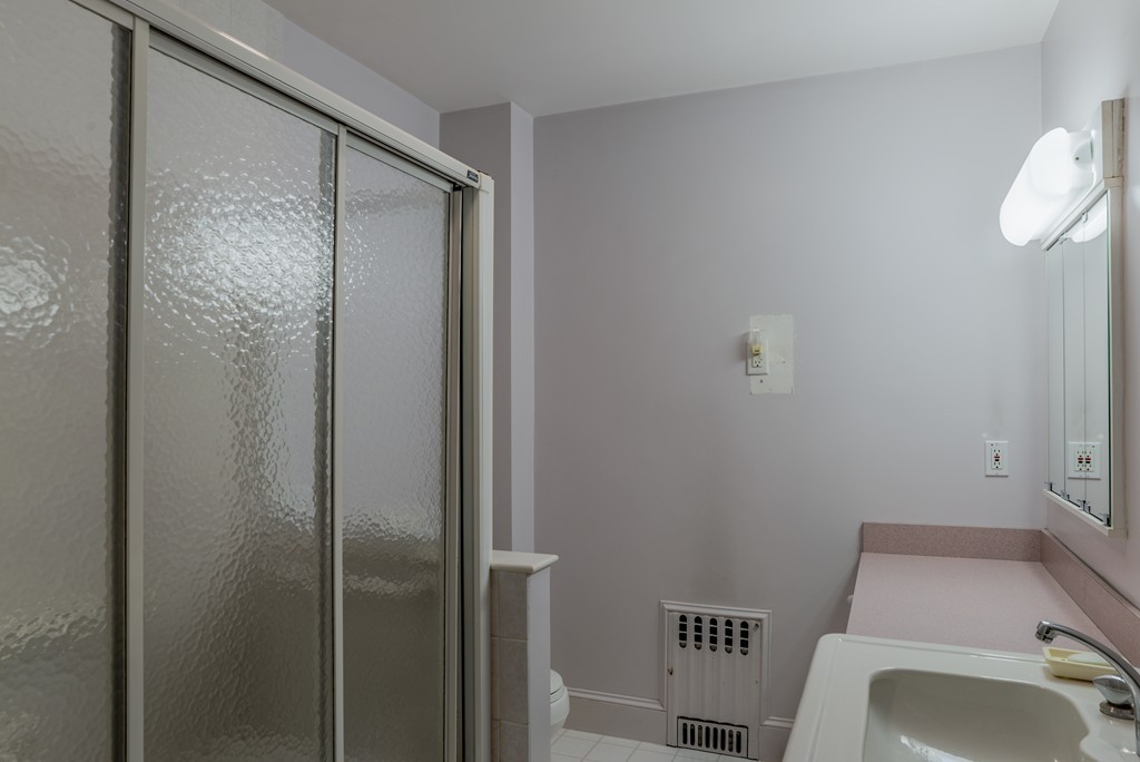 16 Audubon Road Lexington, MA 02421 - Photo 23 of 30 a bathroom with a sink and toilet