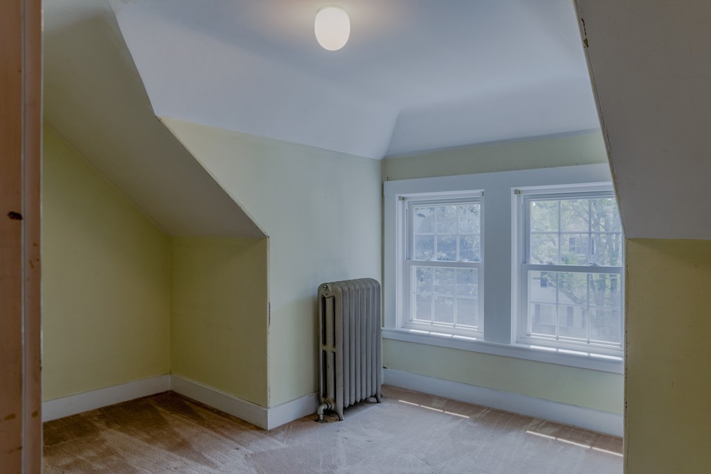 16 Audubon Road Lexington, MA 02421 - Photo 28 of 30 a view of an empty room with a window