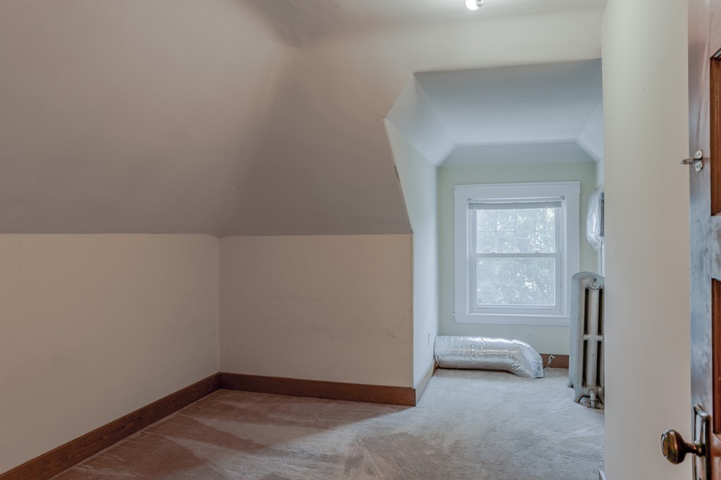 16 Audubon Road Lexington, MA 02421 - Photo 29 of 30 a view of livingroom with hardwood floor and sink