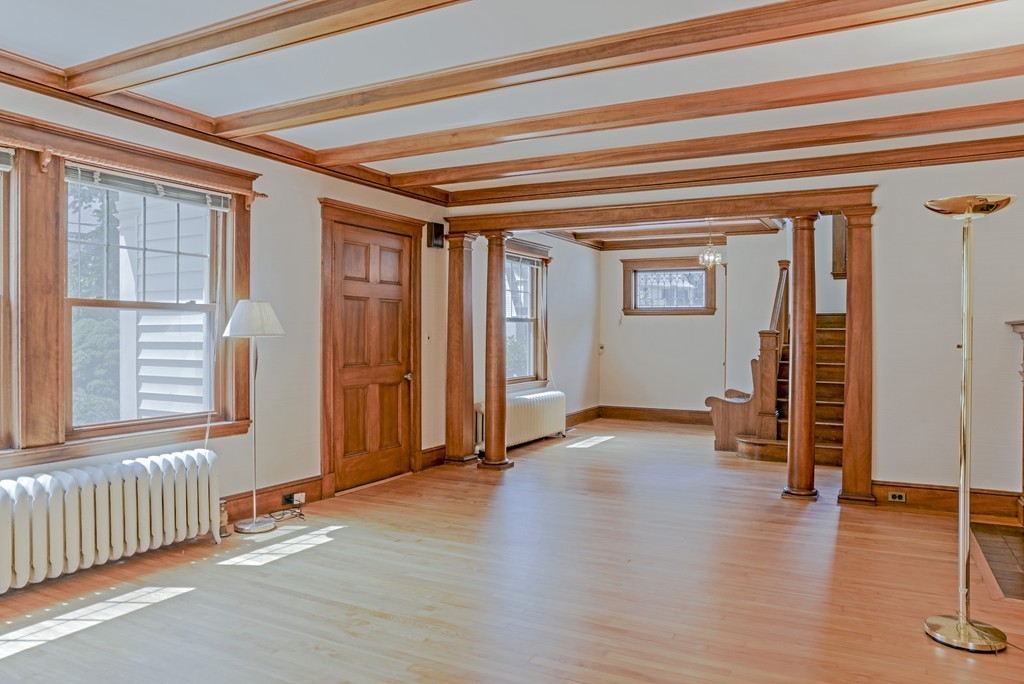 16 Audubon Road Lexington, MA 02421 - Photo 7 of 30 a view of a livingroom with wooden floor and a window