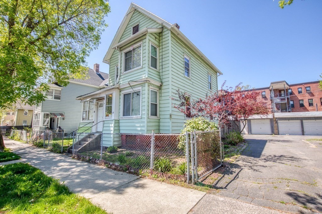 30 Adams Street Springfield, MA 01105 - Photo 1 of 23 a view of a house with a yard