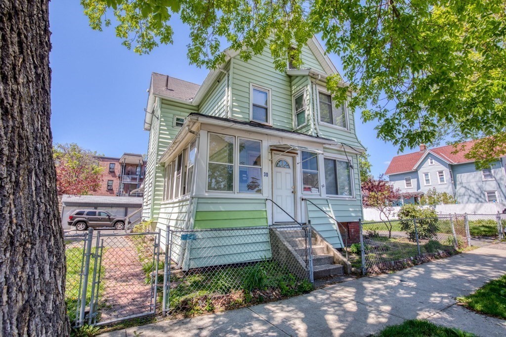 30 Adams Street Springfield, MA 01105 - Photo 20 of 23 a front view of a house with a garden
