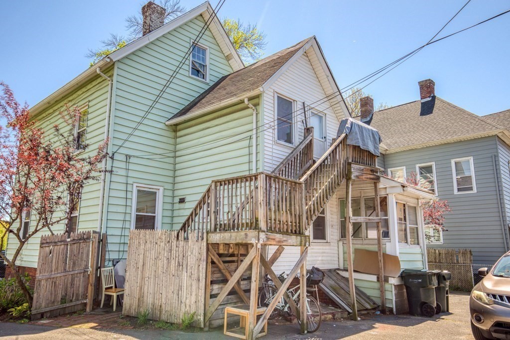 30 Adams Street Springfield, MA 01105 - Photo 2 of 23 a view of a house with wooden deck