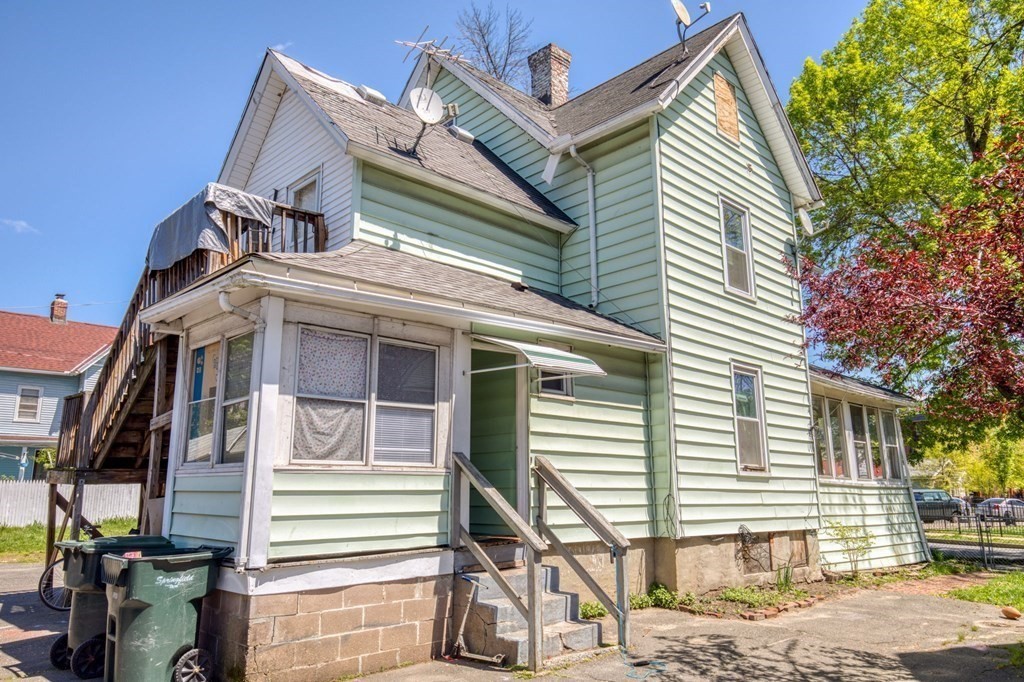 30 Adams Street Springfield, MA 01105 - Photo 4 of 23 a view of a house with a iron stairs