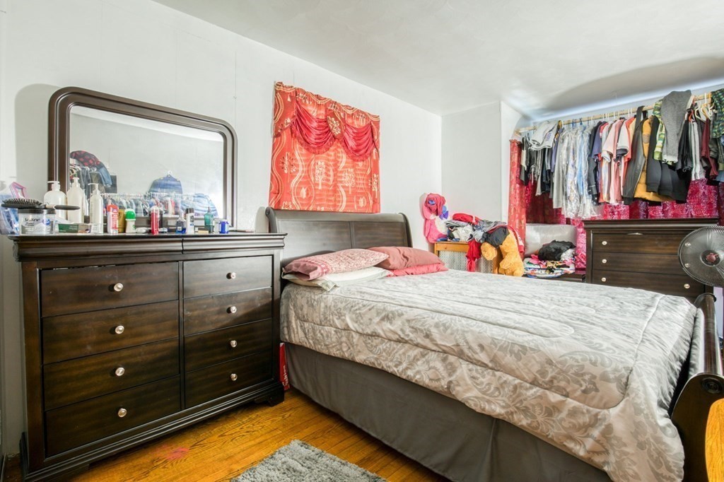 30 Adams Street Springfield, MA 01105 - Photo 7 of 23 a bed room with a bed and a television