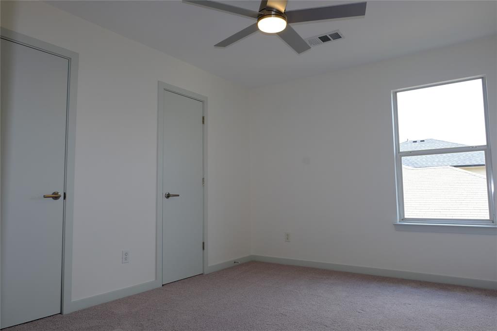 3437 Caprock Ranch Road Fort Worth, TX 76262 - Photo 18 of 27 an empty room with window