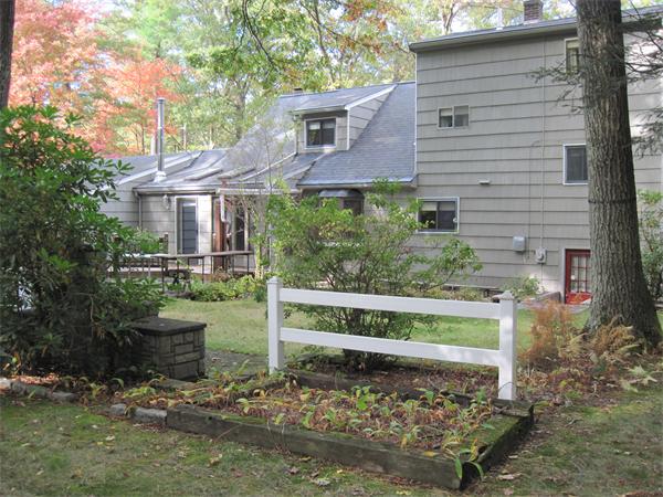 12 Eaton Road Framingham, MA 01701 - Photo 29 of 29 a front view of a house with a yard