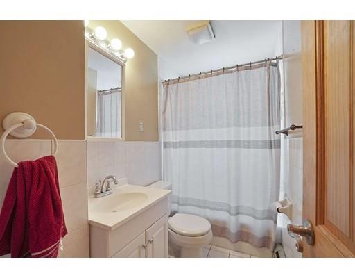 18 Community Road Billerica, MA 01821 - Photo 10 of 22 a bathroom with a sink and a mirror