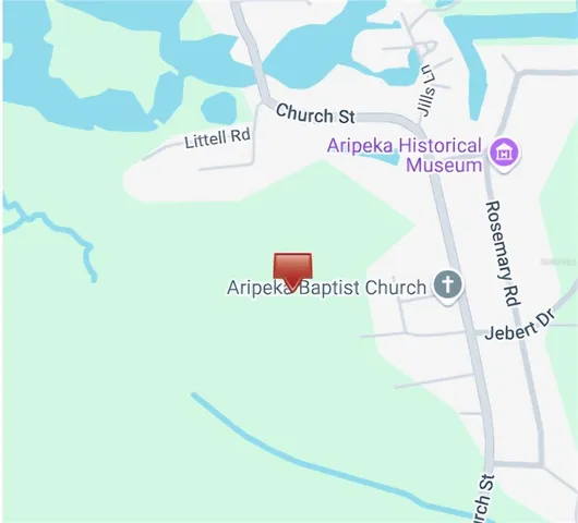 a picture of a book and a white bed