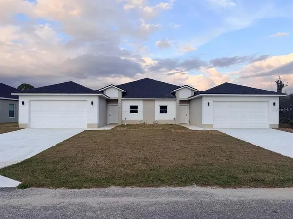 front view of house with a yard
