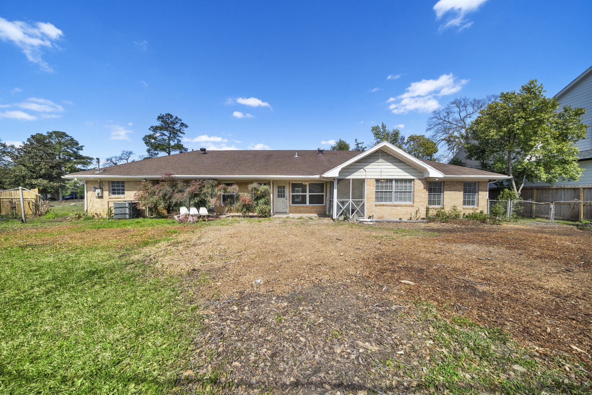404 Milwaukee Street Houston, TX 77009 - Photo 17 of 19 a front view of a house with a yard and garage