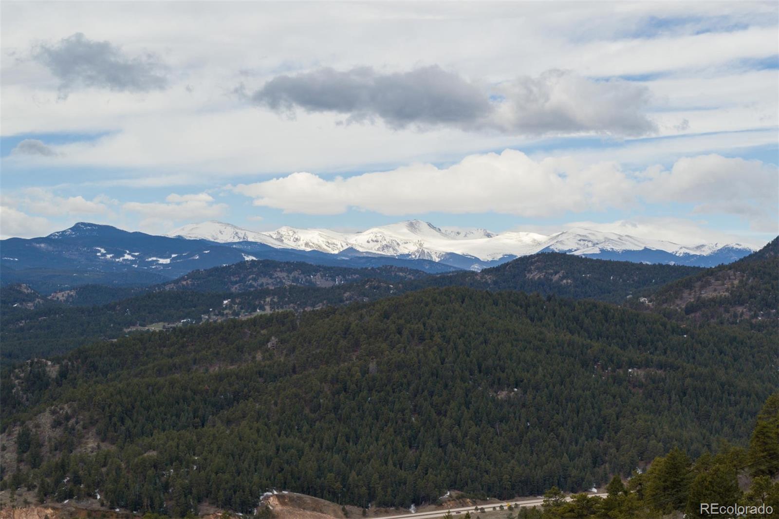 18332 Stone Gate Drive Morrison, CO 80465 - Photo 40 of 40 a view of city and mountain in the distance