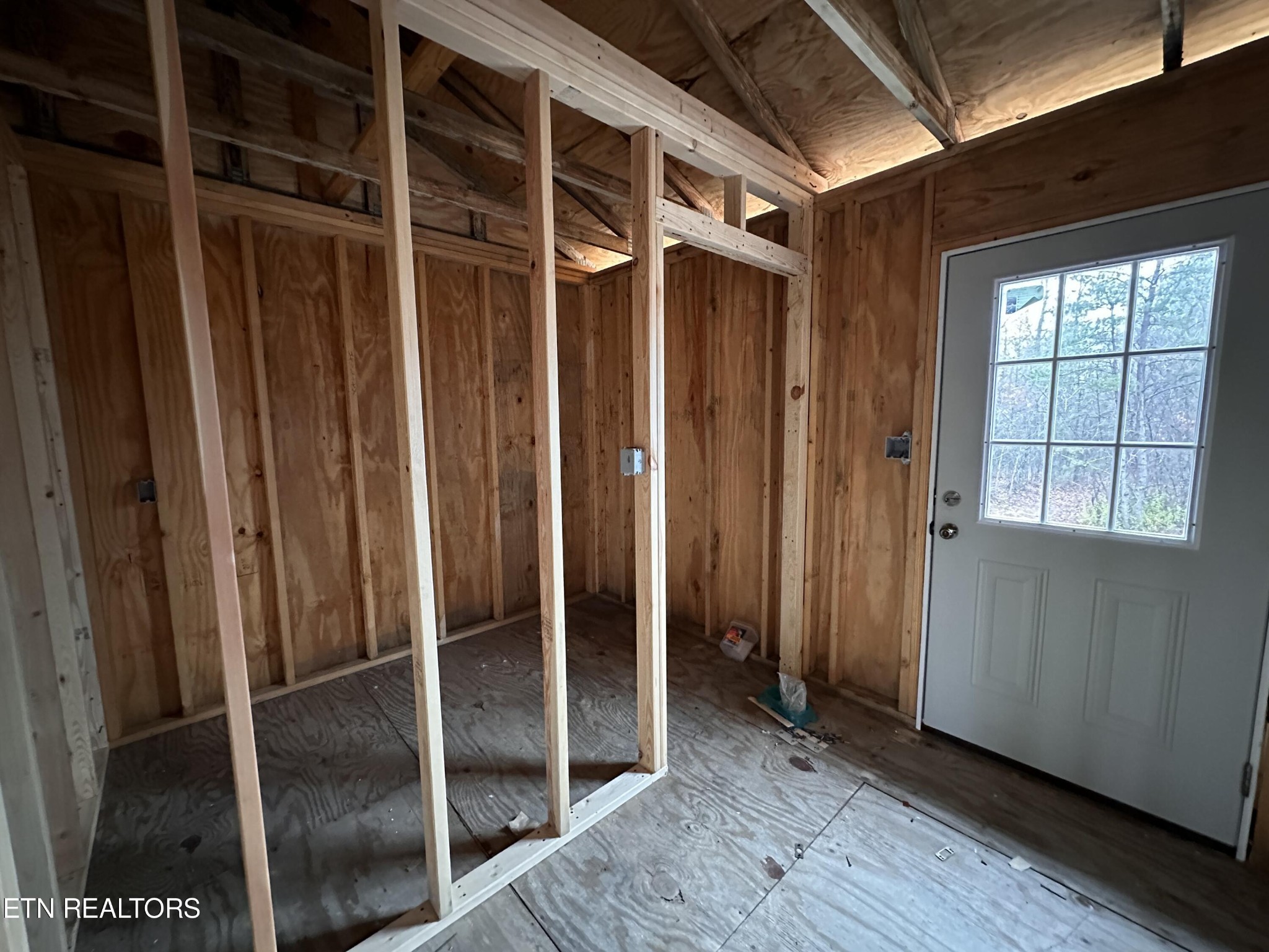 788 Remington Road Jamestown, TN 38556 - Photo 14 of 17 a view of entryway with wooden floor and cabinet