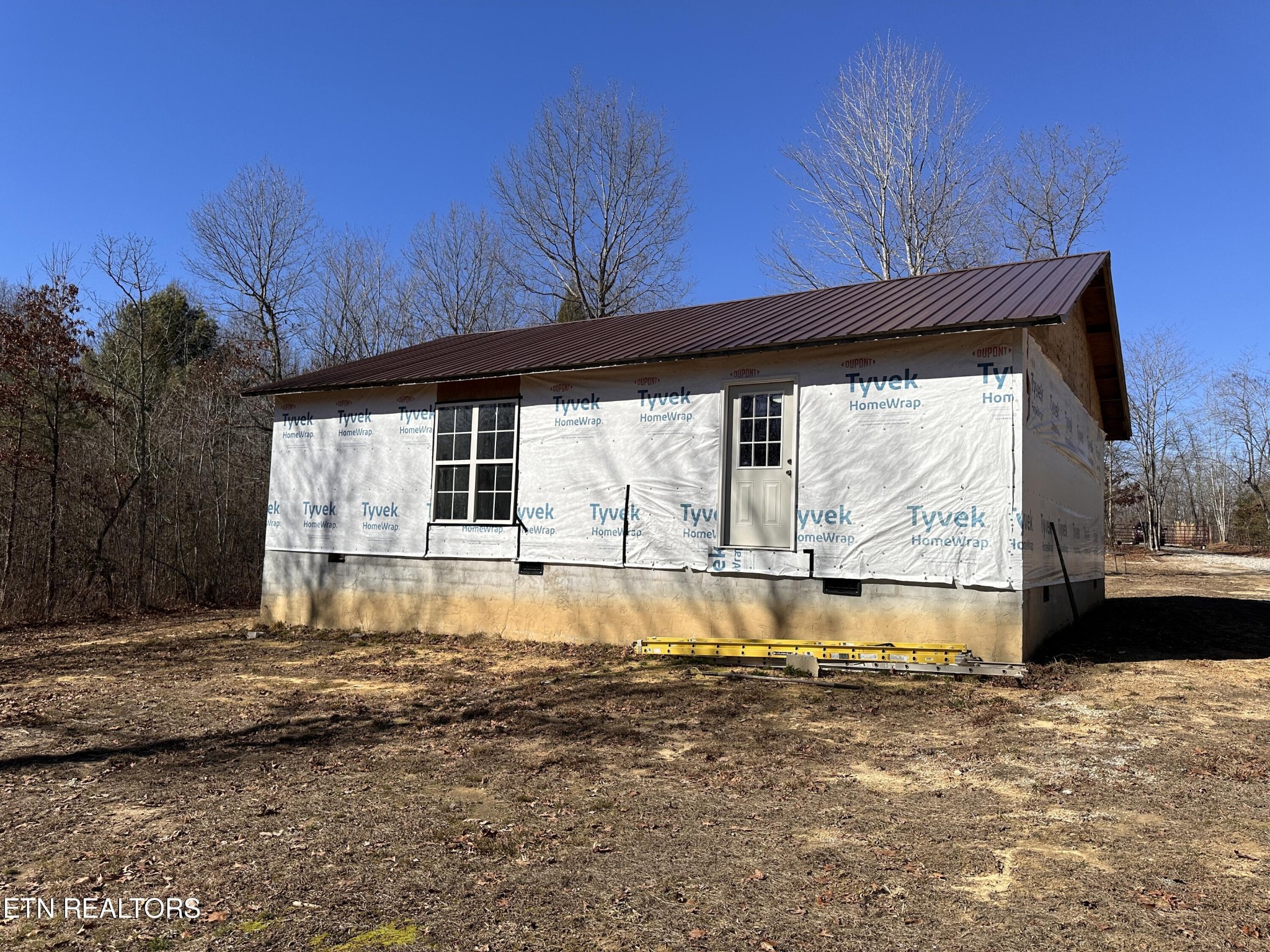788 Remington Road Jamestown, TN 38556 - Photo 5 of 17 a view of a house with a swimming pool