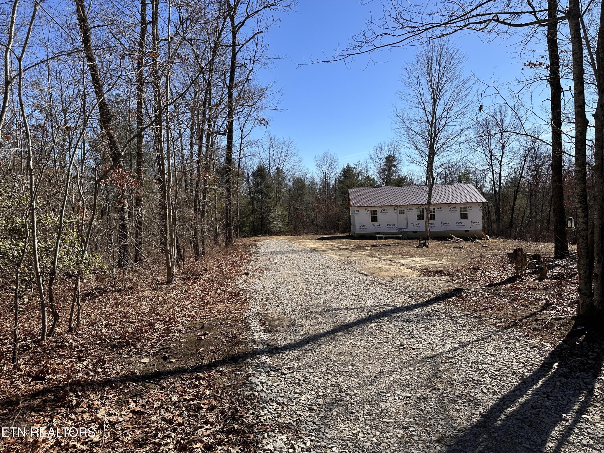 788 Remington Road Jamestown, TN 38556 - Photo 8 of 17 a view of a house with a yard