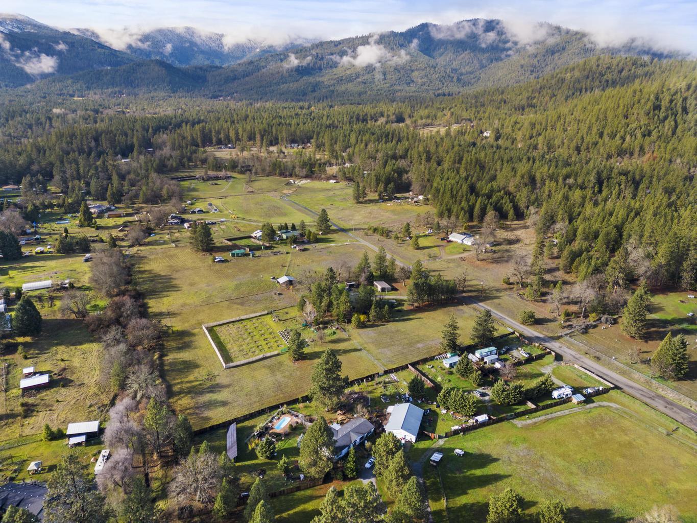 1190 Cedar Flat Road Williams, OR 97544 - Photo 34 of 45 an aerial view of a house with a garden