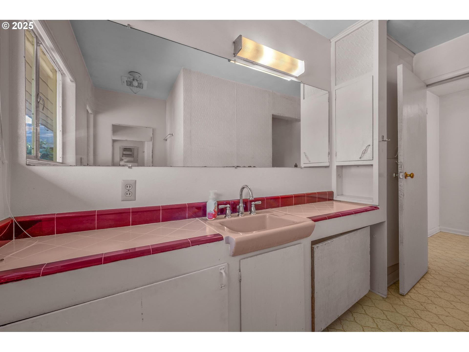 11990 Southwest Denney Road Beaverton, OR 97008 - Photo 20 of 40 a bathroom with a sink and a mirror