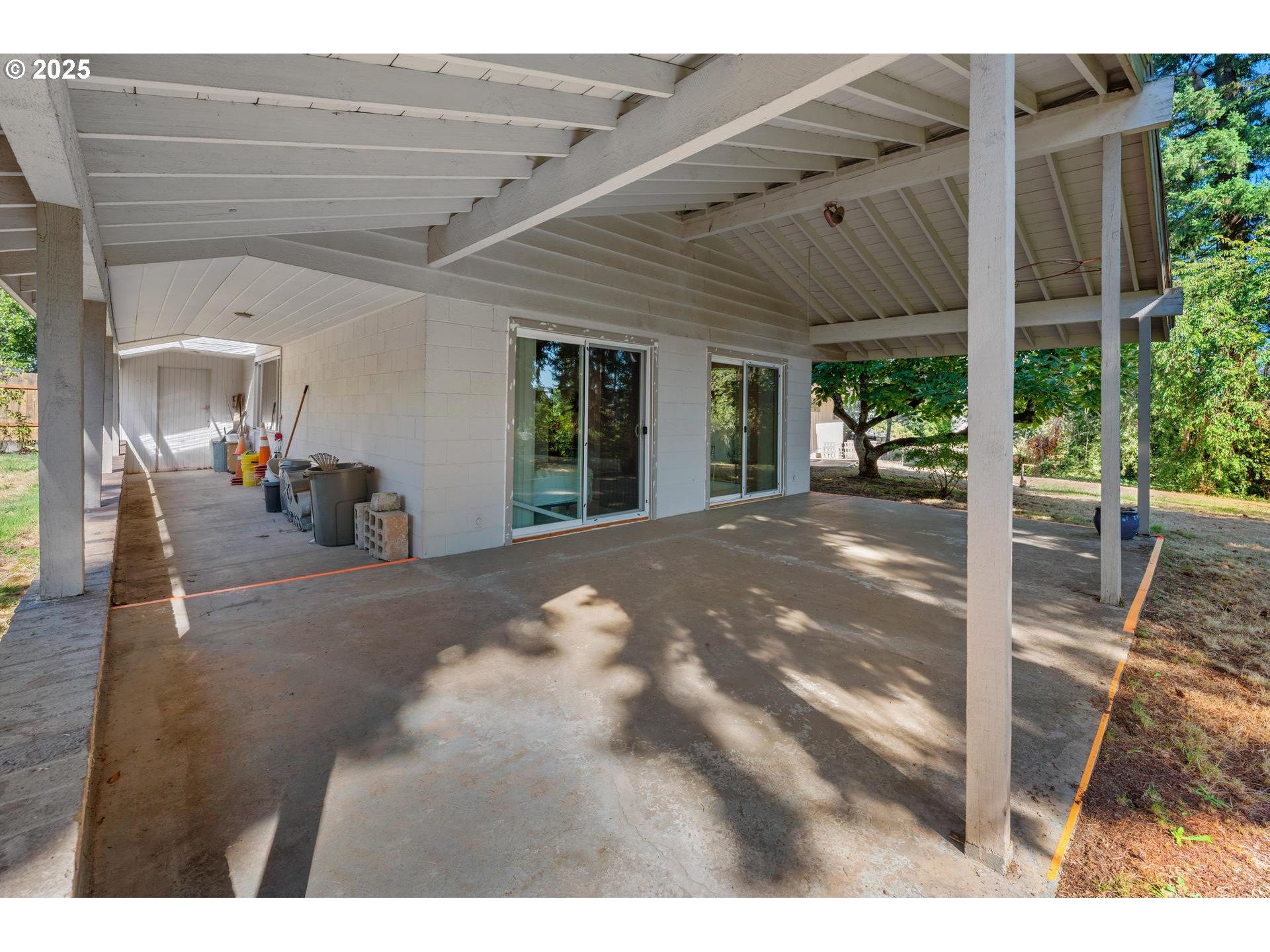 11990 Southwest Denney Road Beaverton, OR 97008 - Photo 23 of 40 a view of a patio with table and chairs