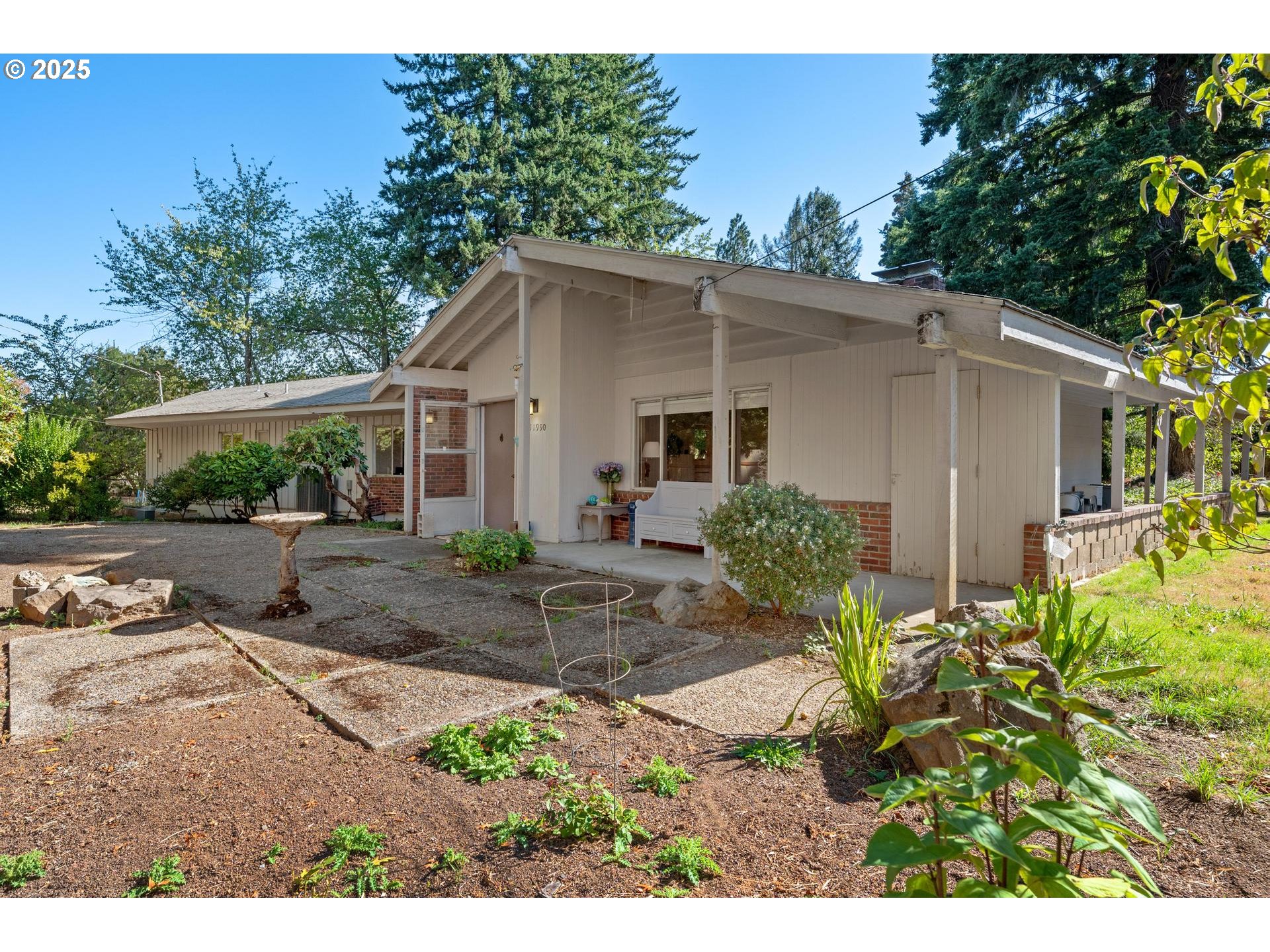 11990 Southwest Denney Road Beaverton, OR 97008 - Photo 25 of 40 a view of a back yard of the house