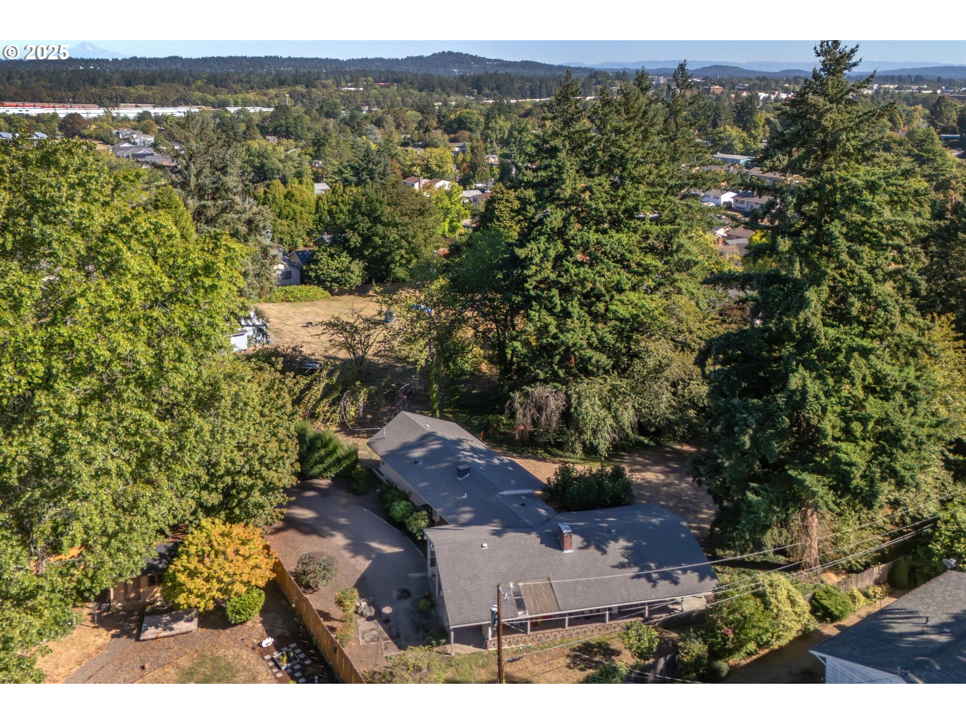 11990 Southwest Denney Road Beaverton, OR 97008 - Photo 31 of 40 an aerial view of a house with a yard