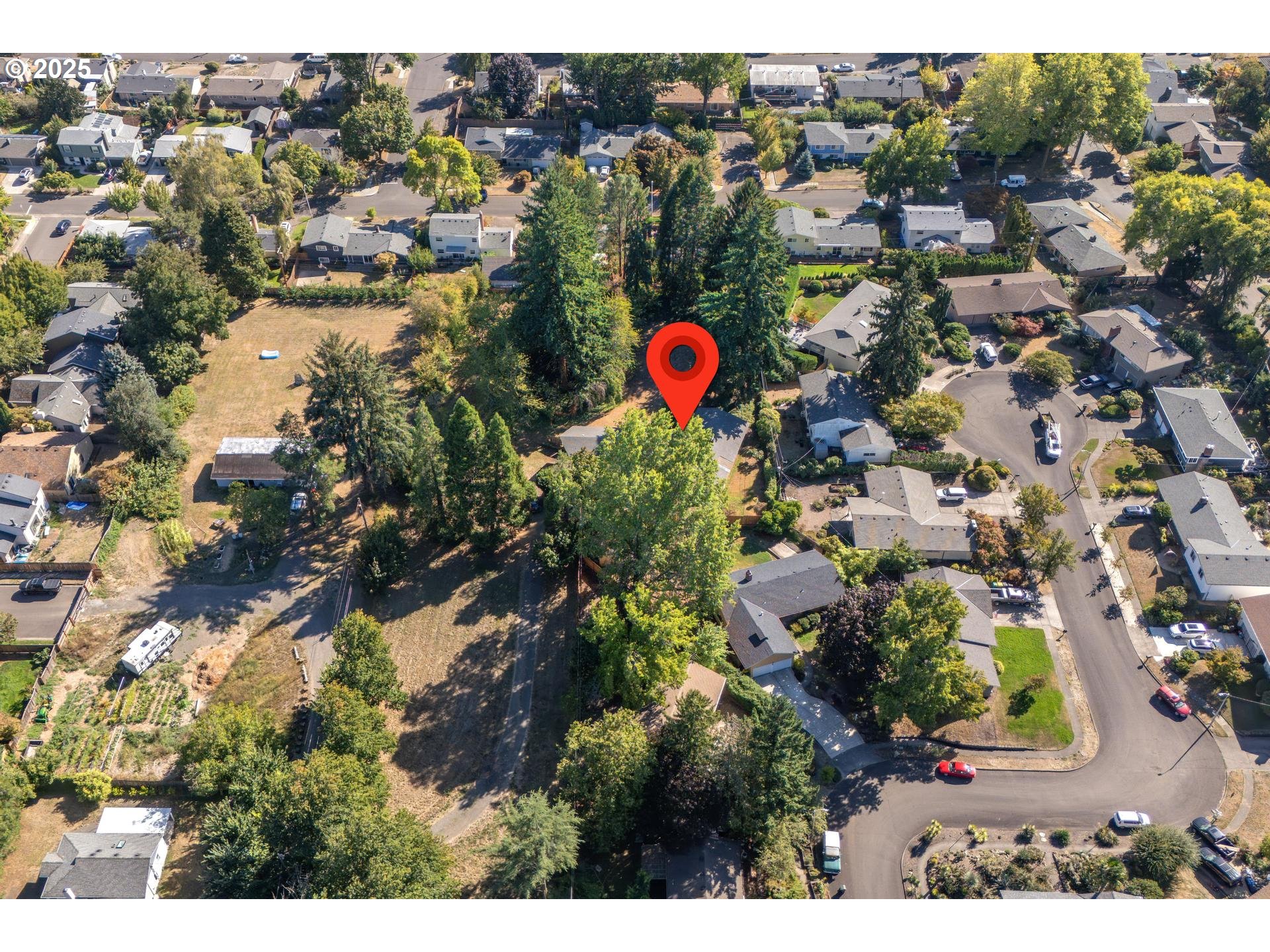 11990 Southwest Denney Road Beaverton, OR 97008 - Photo 35 of 40 an aerial view of residential house with yard and swimming pool