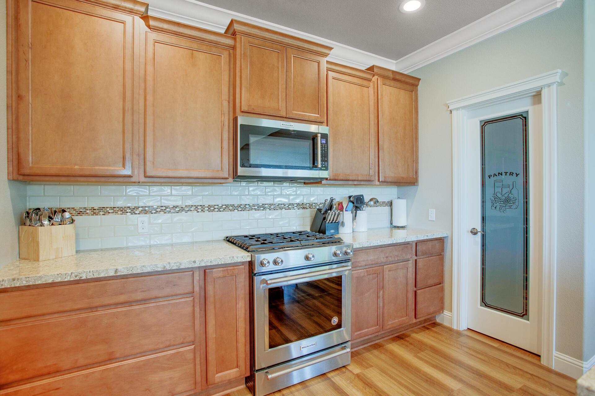 4321 Risstay Way Shasta Lake, CA 96019 - Photo 11 of 38 a kitchen with granite countertop a sink stove and cabinets