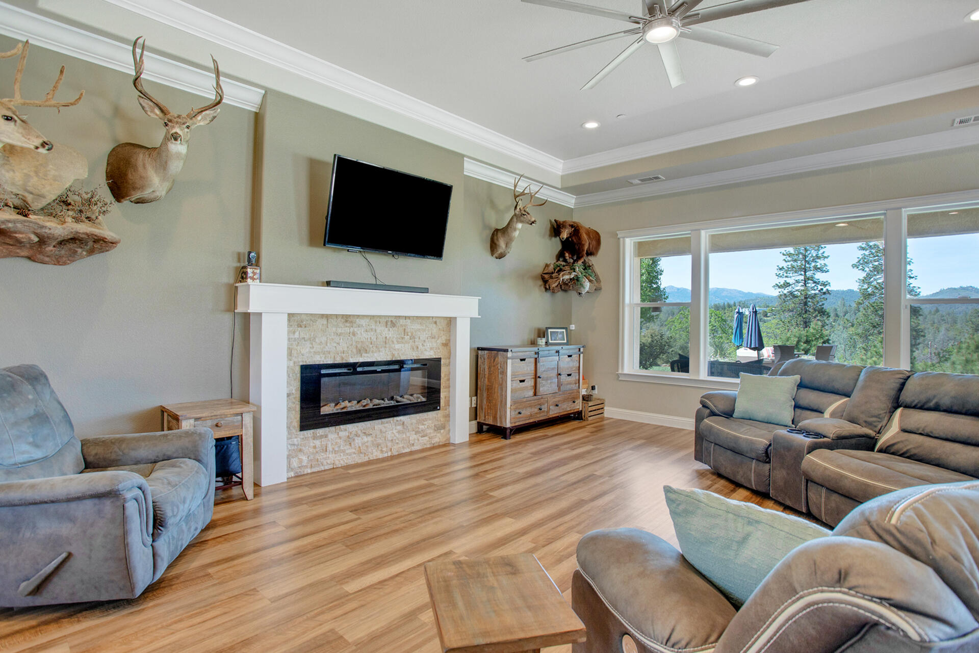 4321 Risstay Way Shasta Lake, CA 96019 - Photo 15 of 38 a living room with furniture fireplace and flat screen tv