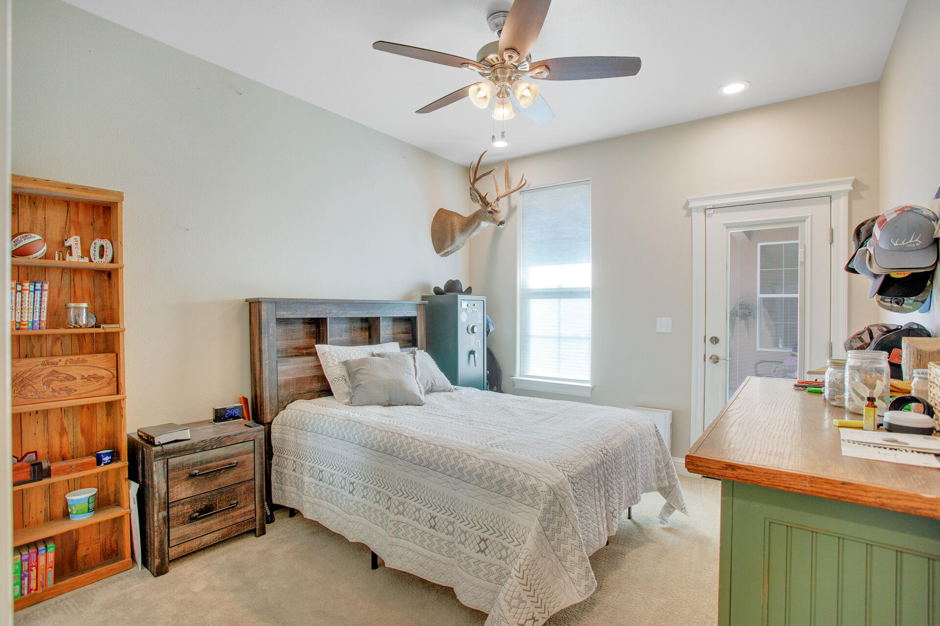 4321 Risstay Way Shasta Lake, CA 96019 - Photo 16 of 38 a bedroom with a bed and a chandelier