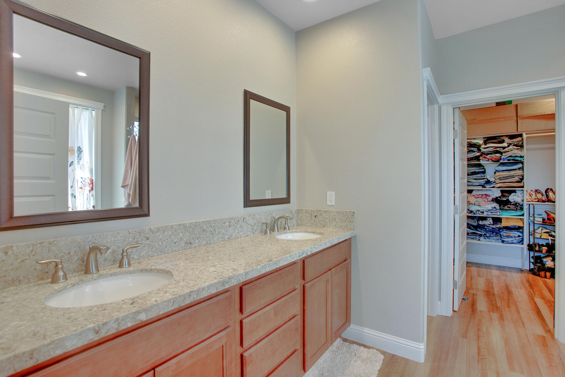 4321 Risstay Way Shasta Lake, CA 96019 - Photo 23 of 38 a bathroom with a granite countertop sink and a mirror