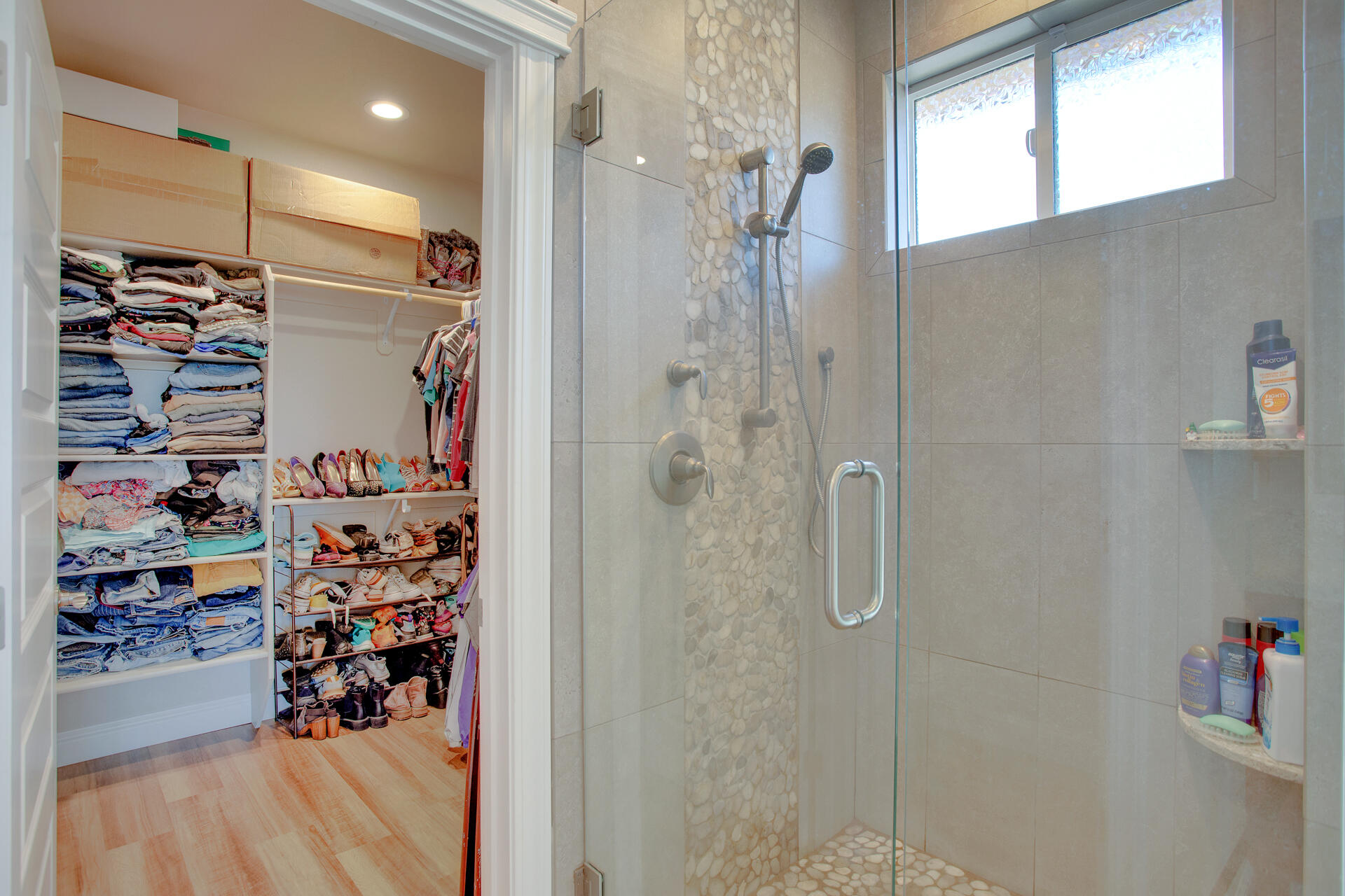 4321 Risstay Way Shasta Lake, CA 96019 - Photo 25 of 38 a view of walk in closet with clothes and shoes